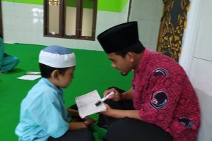 Mendidik anak dengan Al Quran